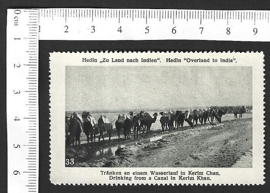 Vintage OVERLAND TO INDIA poster stamp - DRINKING FROM A CANAL IN KERIM KHAN zaz