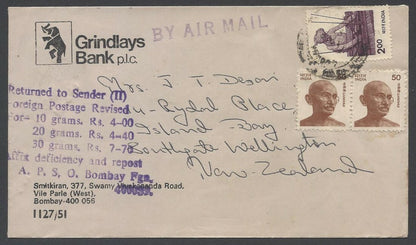 India cover to New Zealand wi FOREIGN POSTAGE REVEISED 8 line instructional mark