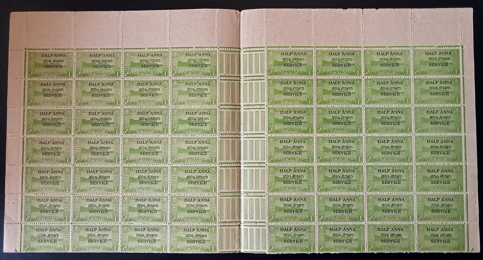 India Travancore Cochin 1/2a on 1ch yellow green gutter block of 56. SG O11 £154
